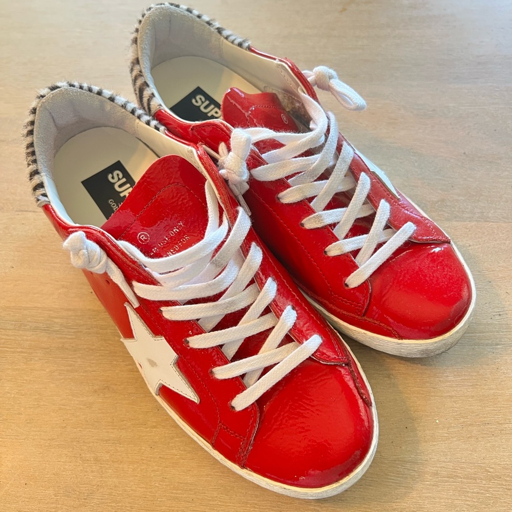 Red Superstar Sneakers with White Star size 38.  Like new